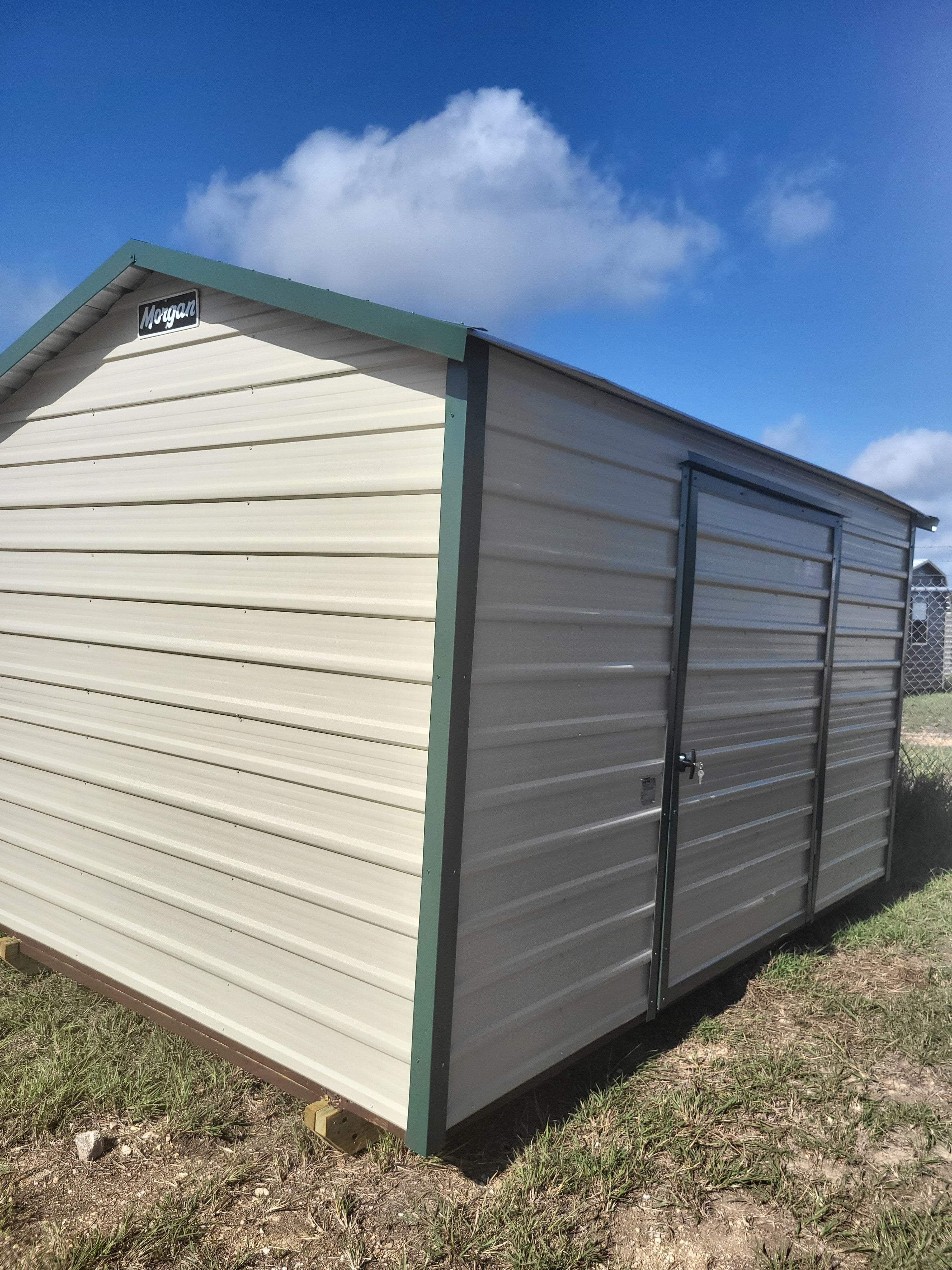 08 x 12 Peak Storage in Tan Steel with Green Trim - H205402