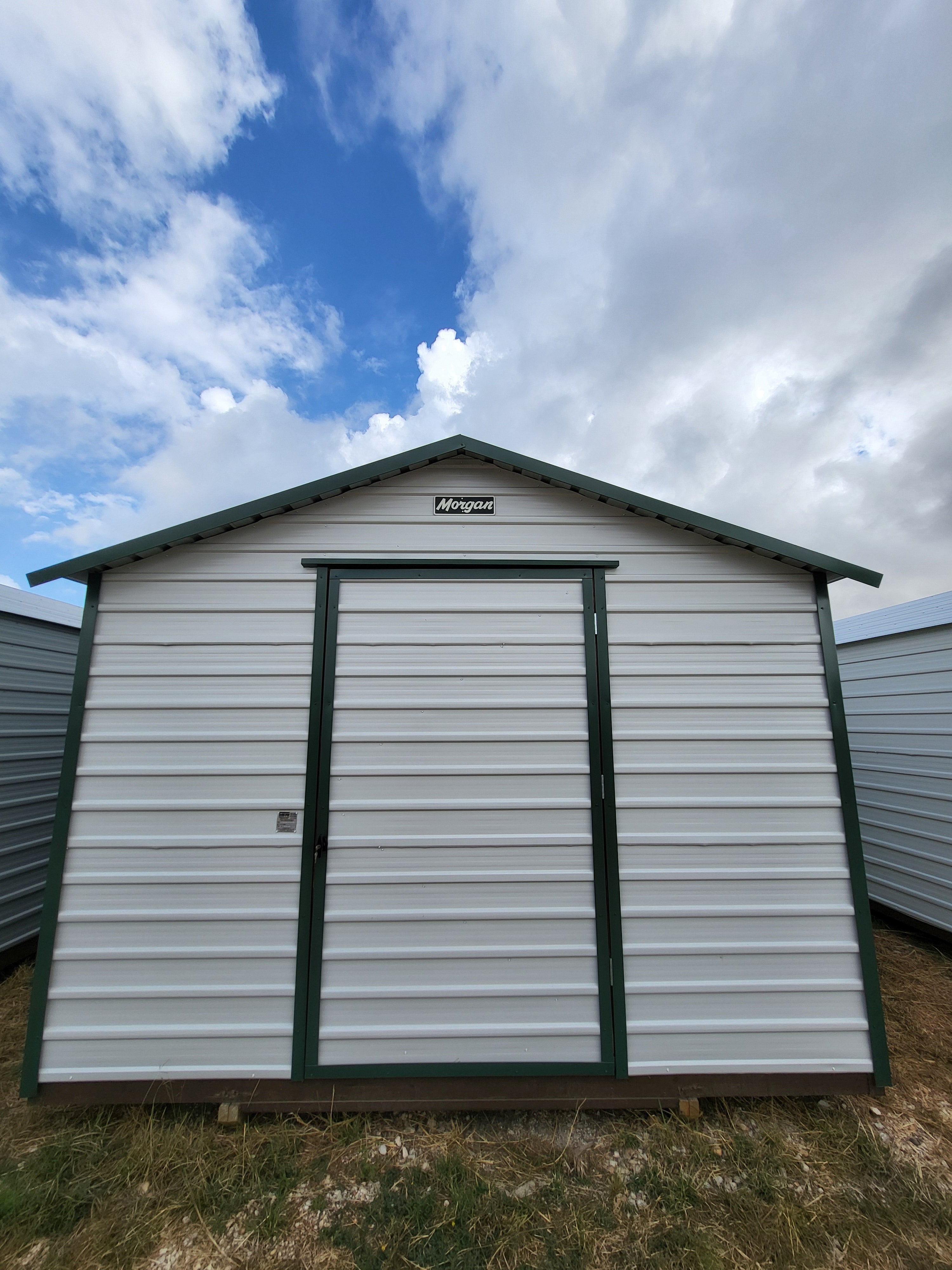 12 x 16 Steel Peak Storage in White with Green Trim - H205185
