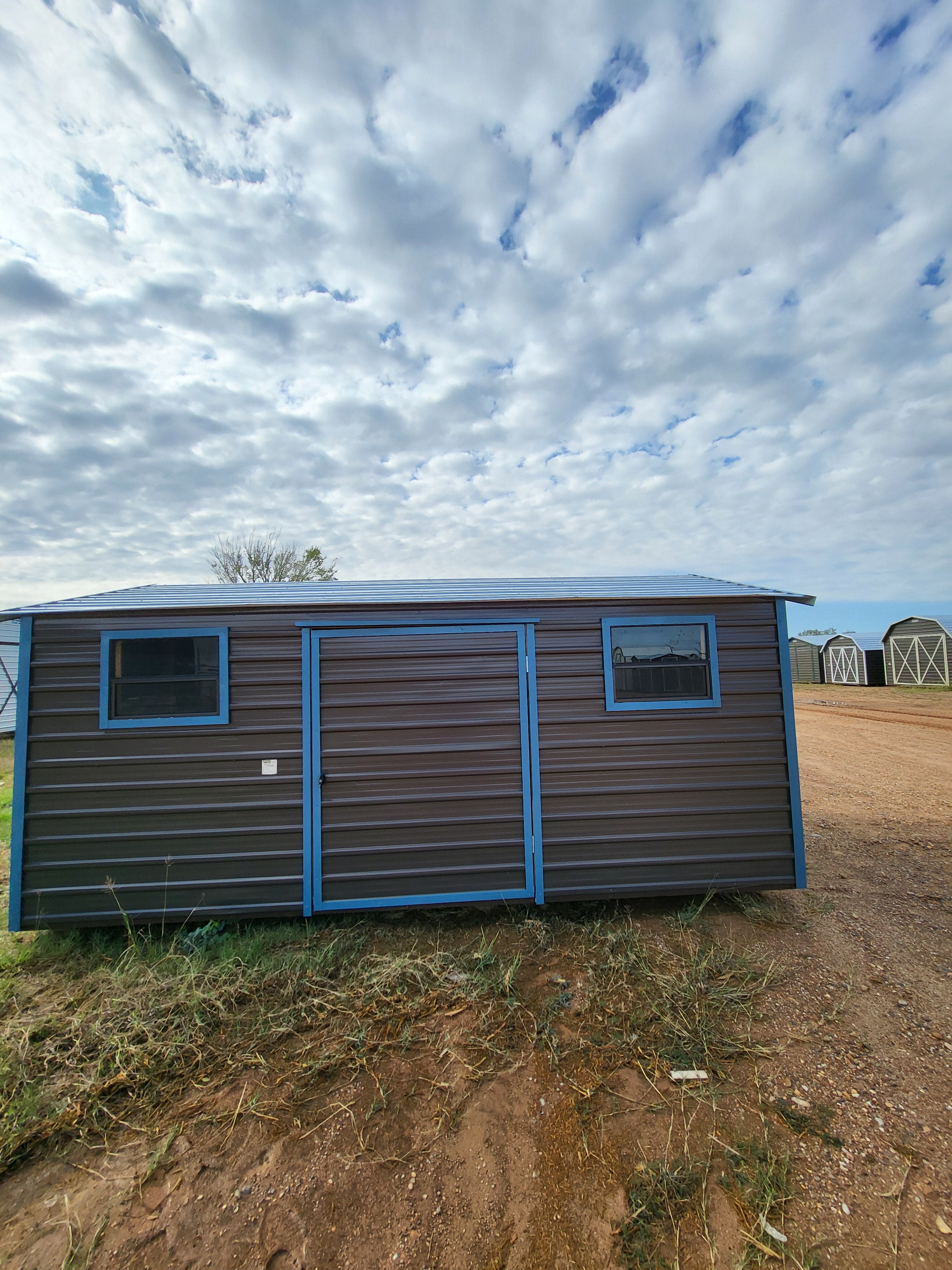 10 x 16 Dark Grey Steel with Blue Trim, Center Door, and Two Windows - H205701